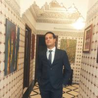 Akram E.