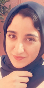 AMINA E.